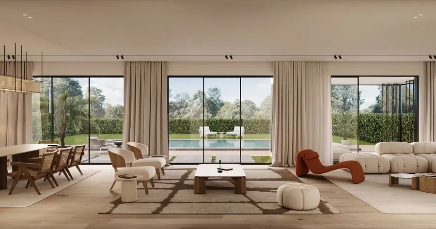 Bright living room opening onto a garden at SODIC East